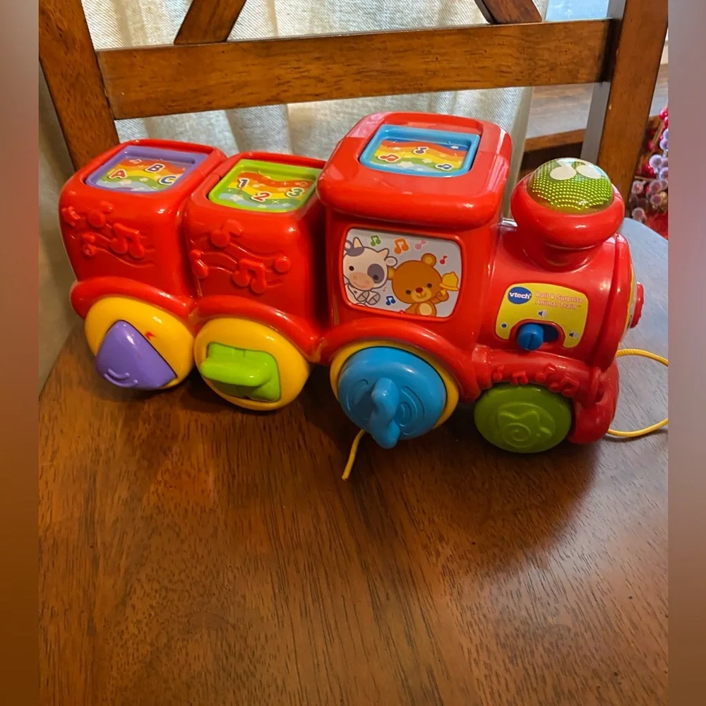 VTech roll and surprise animal train.